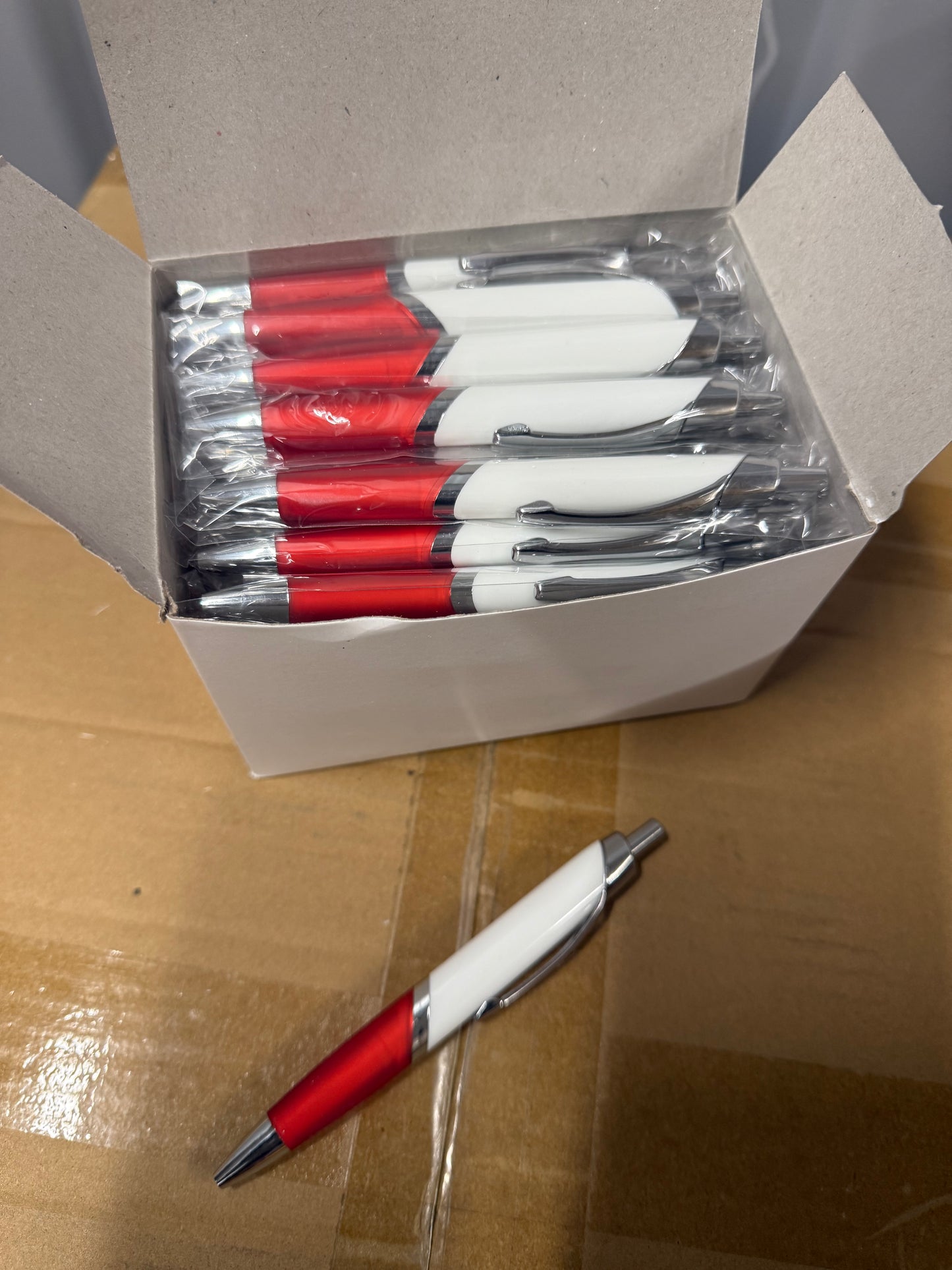 Box of 50 Black ink ball point pens with red plastic trim