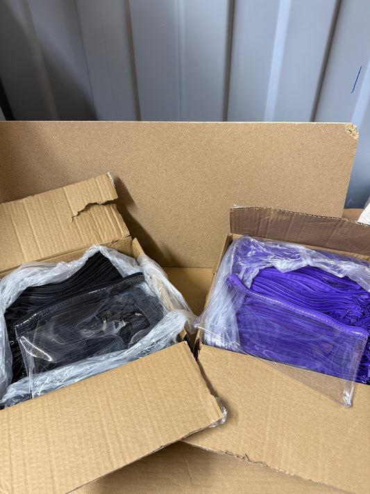 Box of 50 clear pencil cases featuring a colour zip