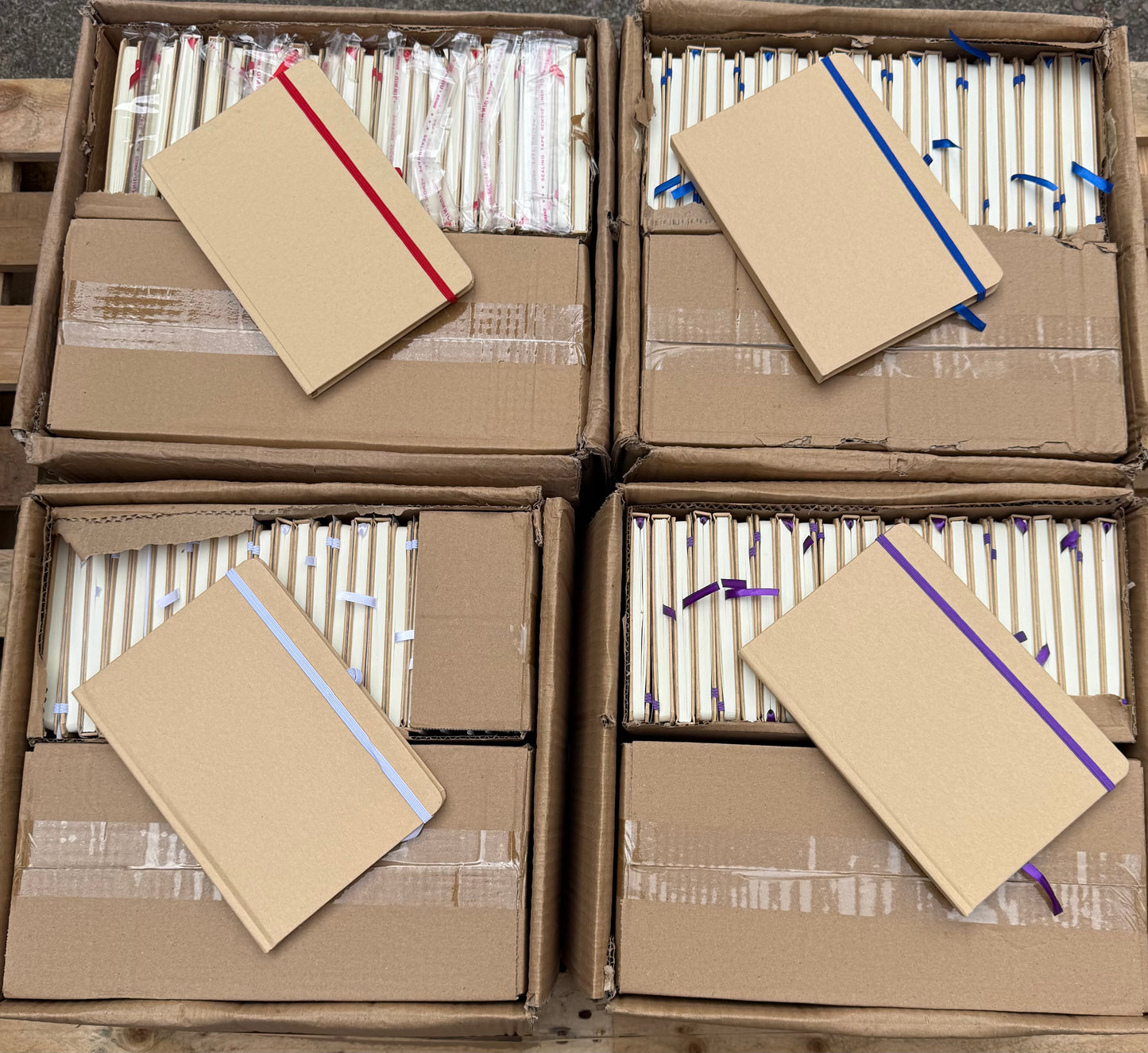 Box of 50 A5 hardback notebooks with coloured closure