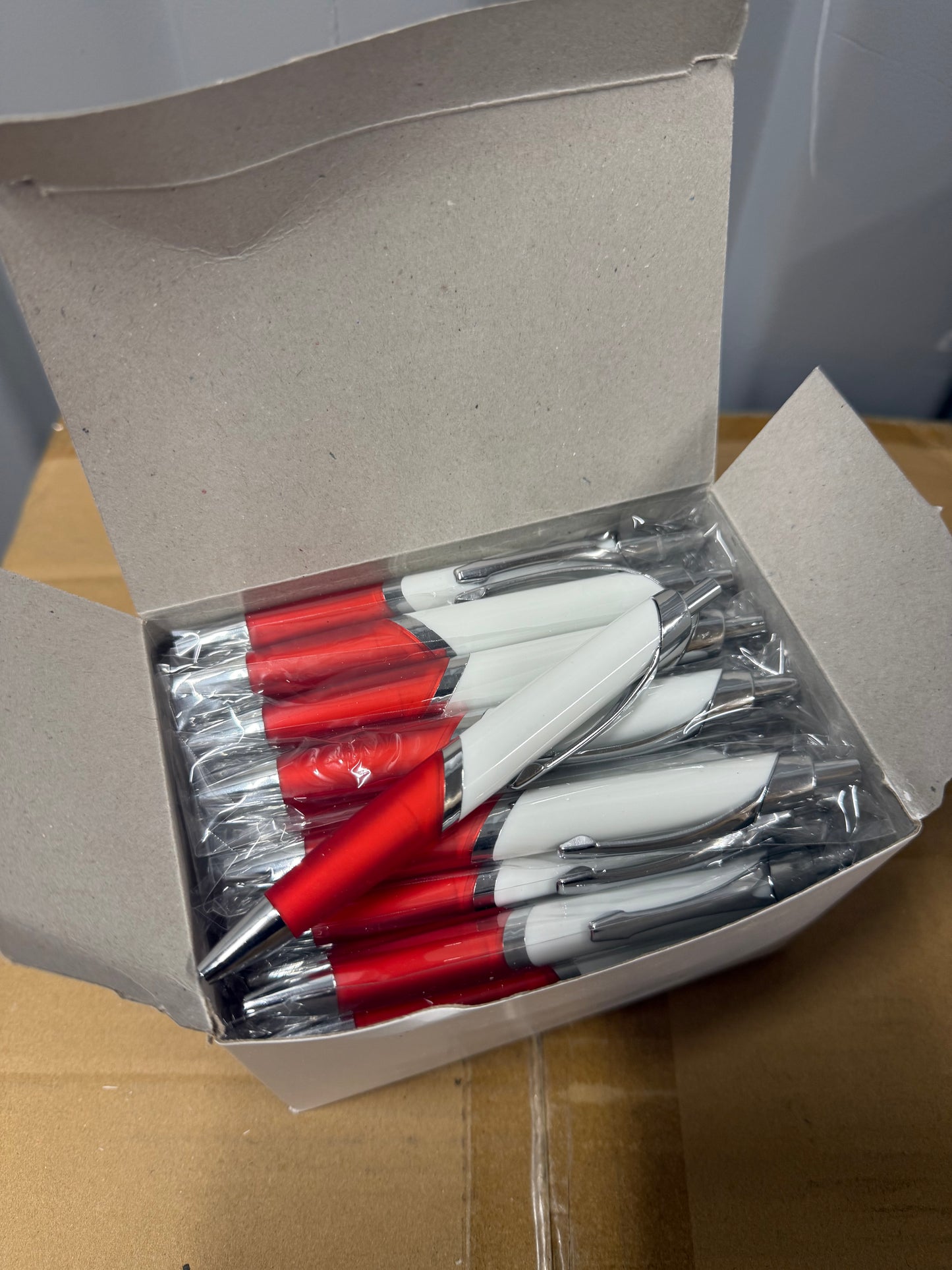 Box of 50 Black ink ball point pens with red plastic trim
