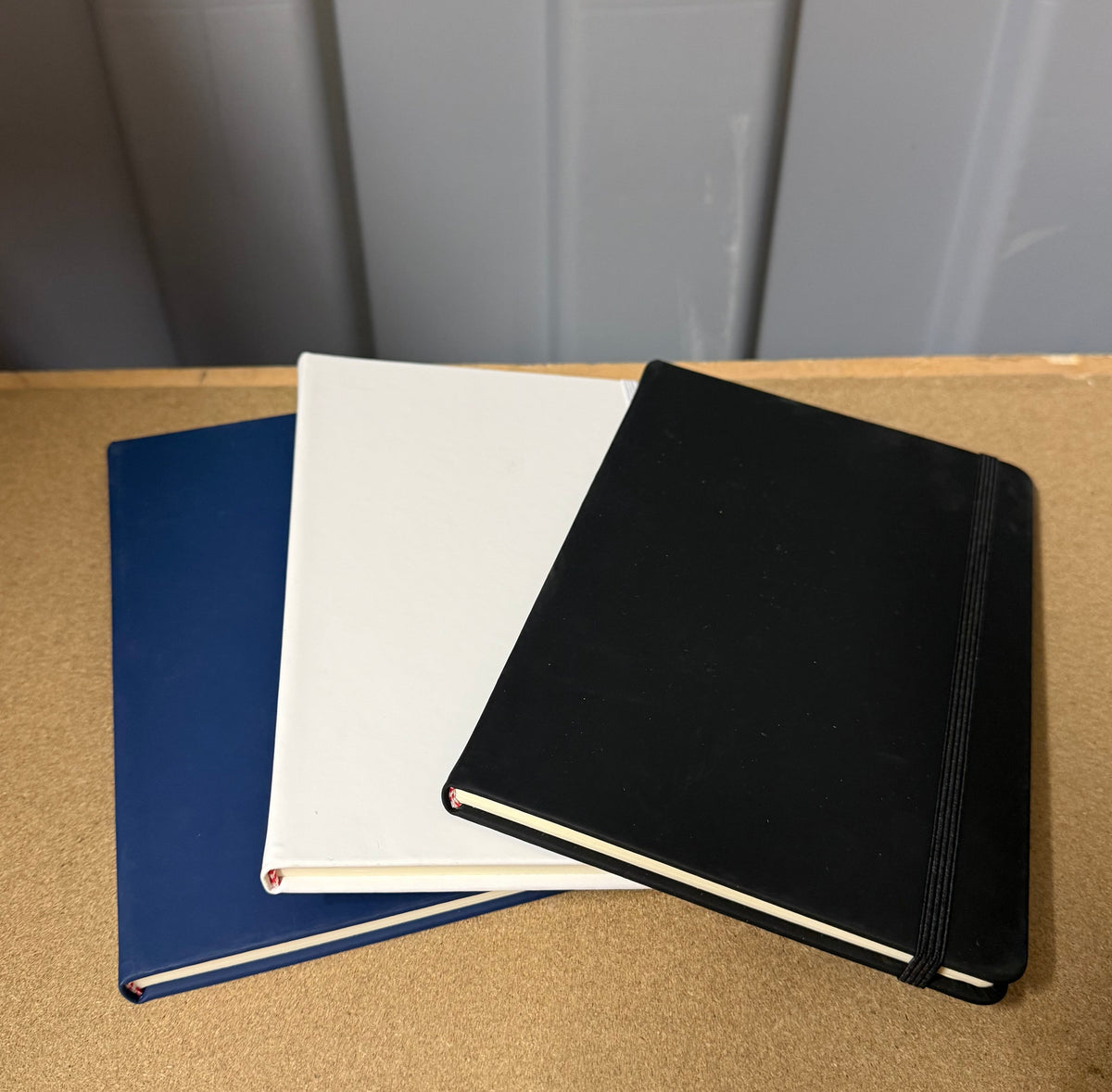 A5 PU hardback notebooks with elastic closure, bundles of 10 or full boxes of 50