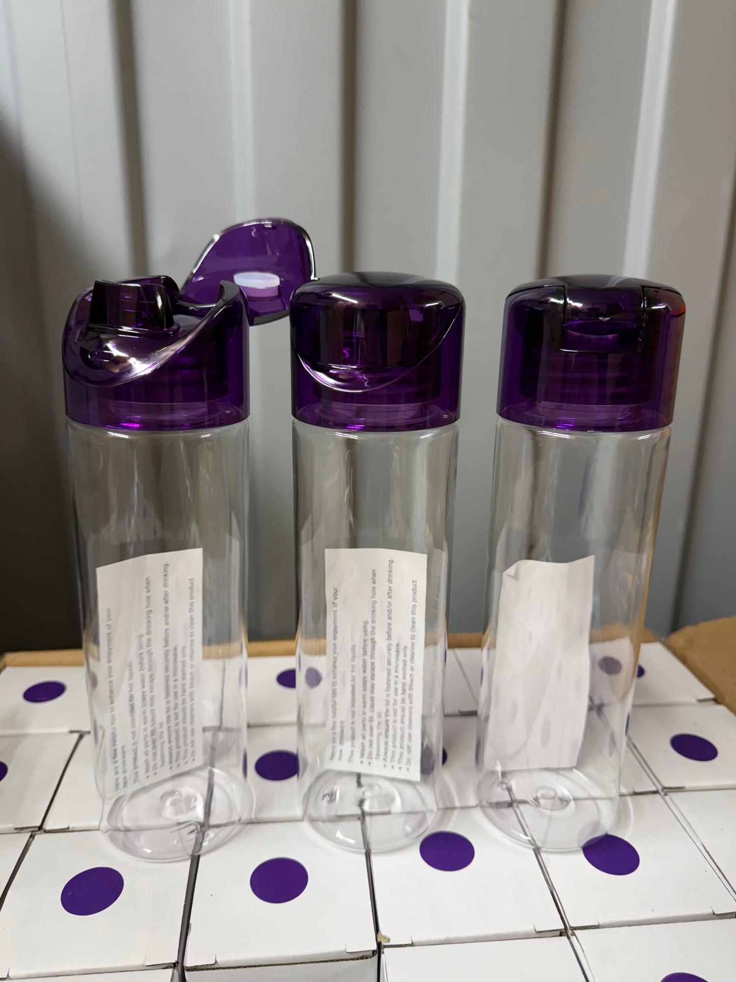 3x Clear 700ml water bottles with purple flip lids