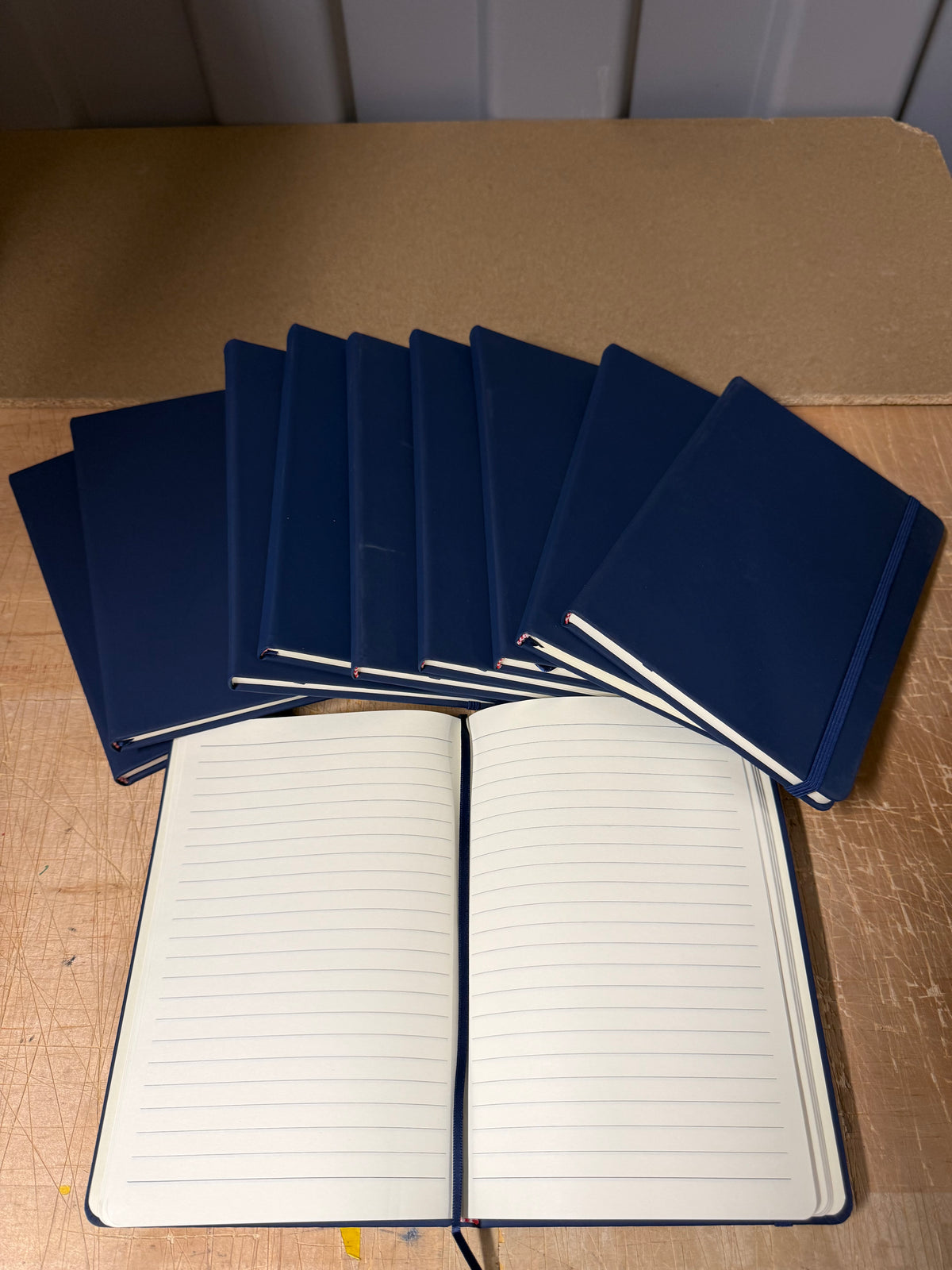 A5 PU hardback notebooks with elastic closure, bundles of 10 or full boxes of 50