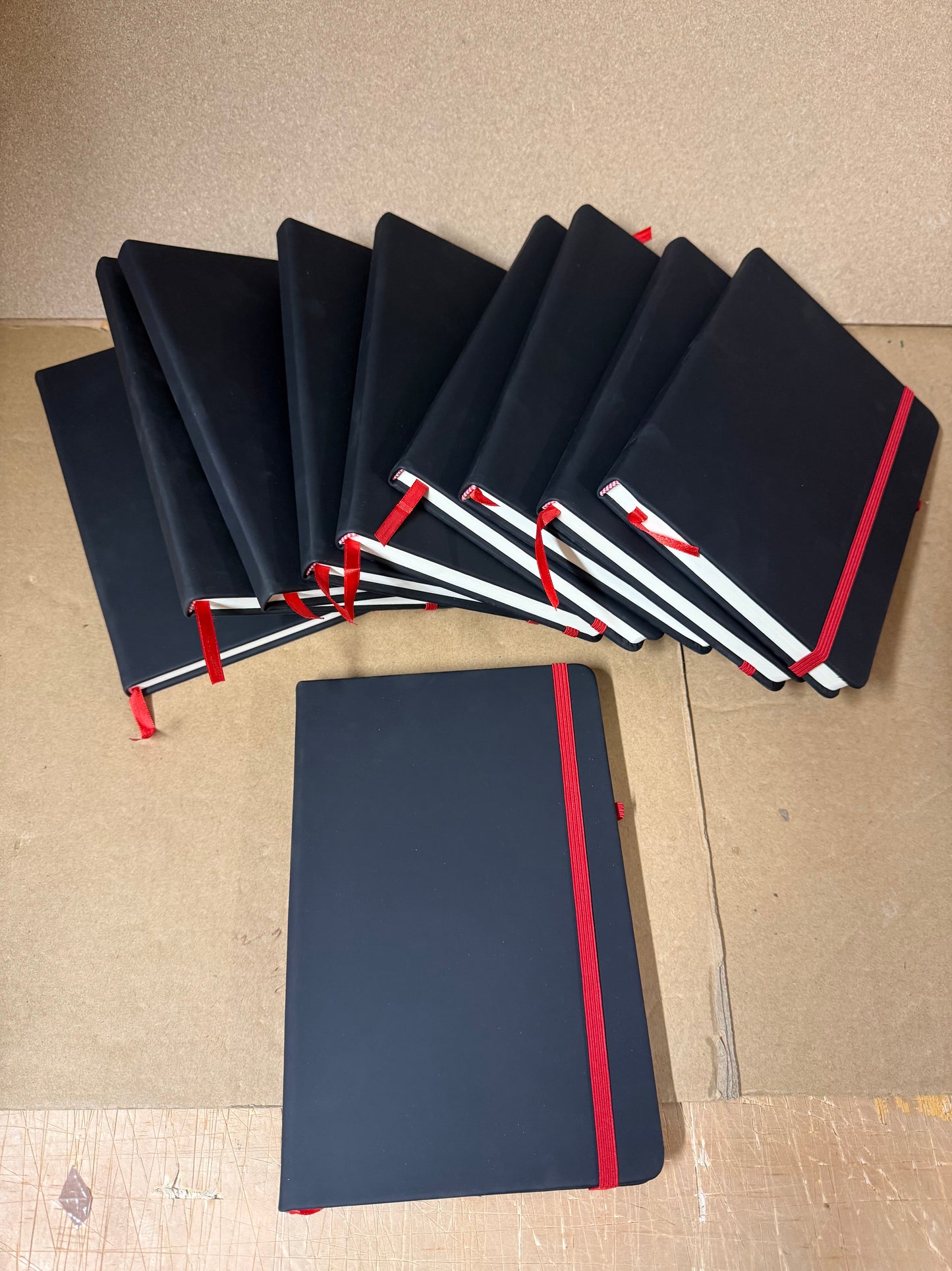 Bundle of Black A5 PU hardbacked notebooks with coloured closure