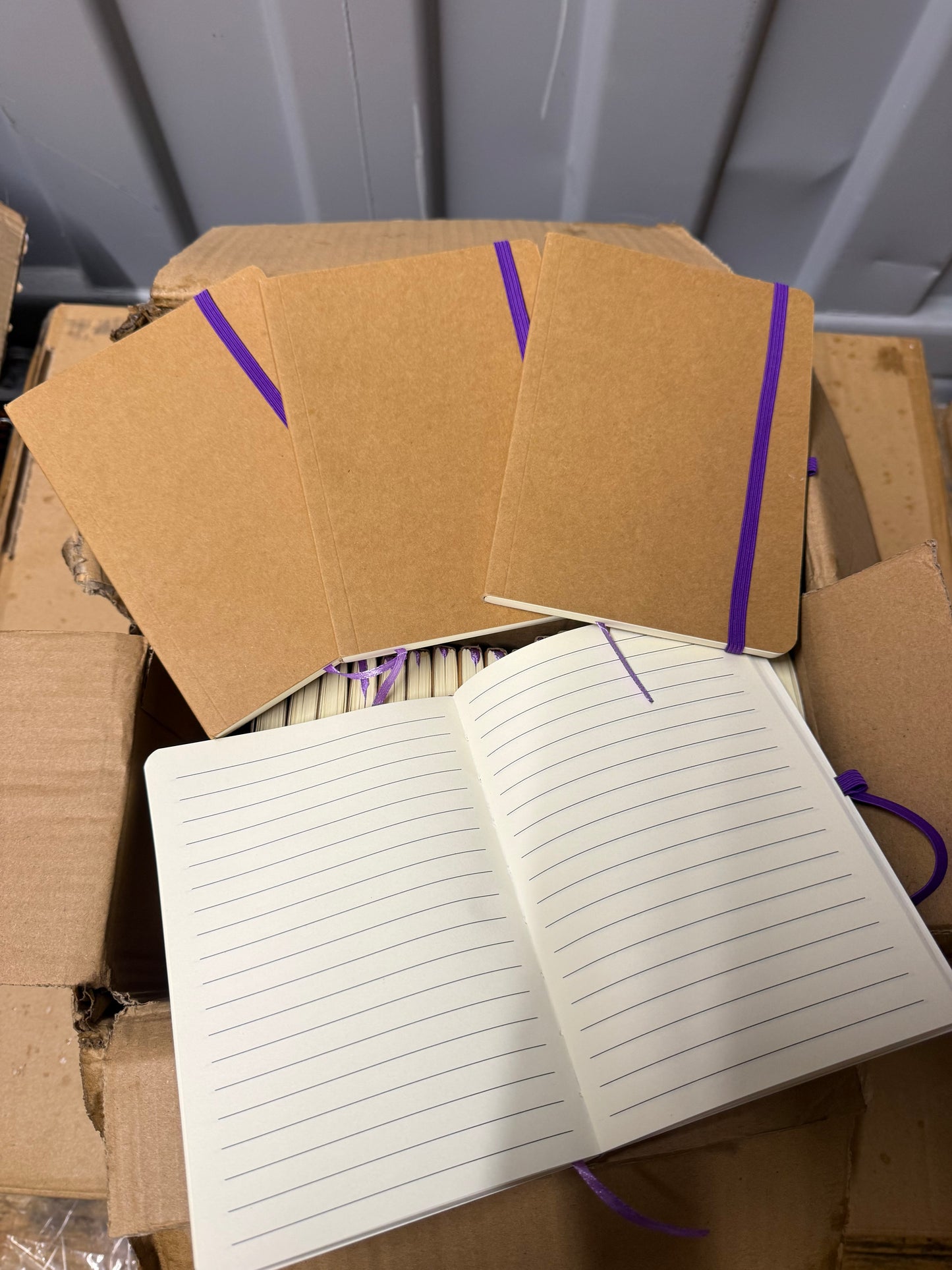 Box Of 50 Purple, Red, white Closure Notebooks